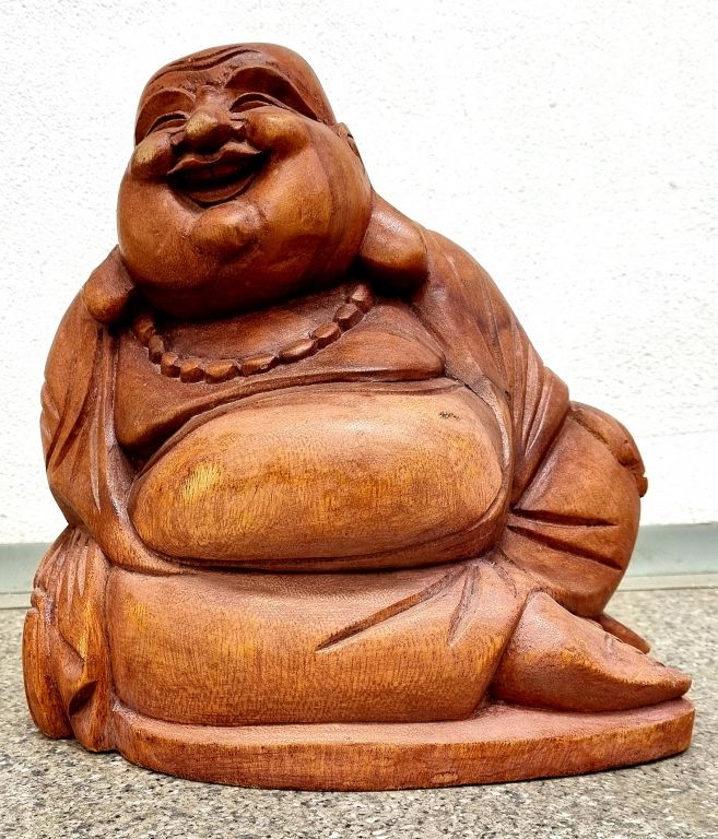 Dřevěná socha Buddha relax